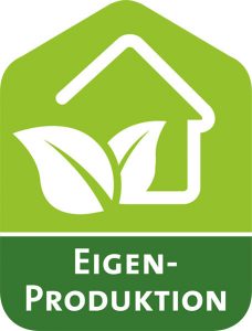 Grünes Logo der Kampagne „Eigenproduktion“. Darauf sind in Weiß die Umrisse eines Hauses und zweier Blätter eingezeichnet.